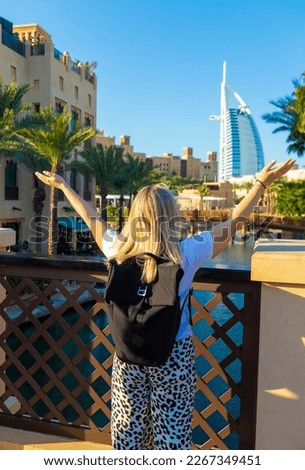 The beach in Dubai resort is perfect place to soak in the sun and admire the modern architece, expensive boats, and high-rises that dominate the skyline, all under the bright sun 