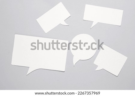 Different shapes White blank paper-cut speech bubbles on white background. Chat, social media, discussion. Mock up for template design