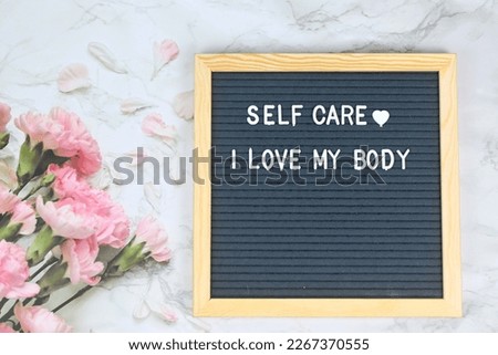 Grey letter board with phrase Self care I love my body. Self love, Mindfulness lifestyle, mental health. Aspiration, affirmative and supportive sentence. Body Neutrality, Royalty-Free Stock Photo #2267370555