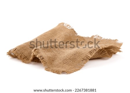 Old burlap fabric napkin, sackcloth piece isolated on white background Royalty-Free Stock Photo #2267381881