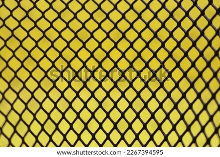 Black metal or steel mesh screen background seamless and texture