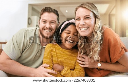 Family, adoption and happiness portrait with foster child, mother and father together for love, care and trust together on living room couch. Smile, support and laughing man, woman and girl bonding Royalty-Free Stock Photo #2267403301