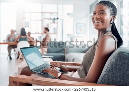 Music, podcast and woman at computer with earphones in office with streaming service while working. Work, smile and happy black woman listening to streaming radio station app online in modern office.