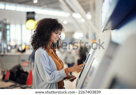 Black woman, airport and smile by self service station for ticket, registration or boarding pass. Happy African female traveler by kiosk machine for travel application, document or booking flight Royalty-Free Stock Photo #2267403839