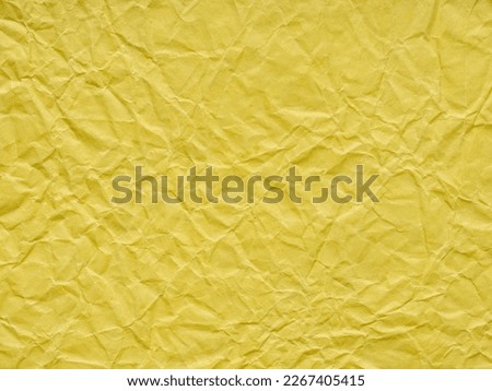 Bright yellow matte detail crumpled paper texture. Blank page pattern or background for winter season Christmas festival card, new year designs, text, lettering, 3d. Sheet or page for decoration art.