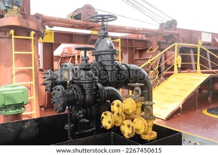 bunker manifolds of a ship Royalty-Free Stock Photo #2267450615