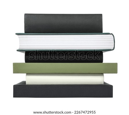 Stack of different hardcover books on white background