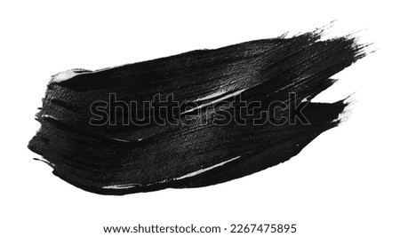 Smear of black paint on white background Royalty-Free Stock Photo #2267475895