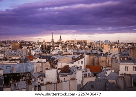 Eiffel Tower and Invalides in Paris Skyline at dramatic evening, France