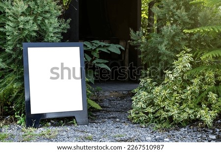 Outdoor blank welcome sign entrance to coffee shop
