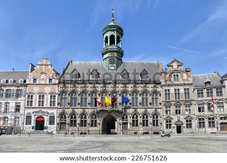 Gothic style City Hall and it's renaissance bell tower on the Grand Place square in Mons, Belgium Royalty-Free Stock Photo #226751626