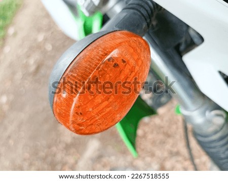 close-up photo of motorbike turn signal light