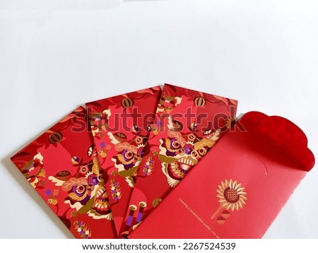 Chinese red envelope, angpao or angpau isolated white with copy space. money gift for happy Lunar New Year holiday. Envelope Red gift bag for the money in the Chinese New Year