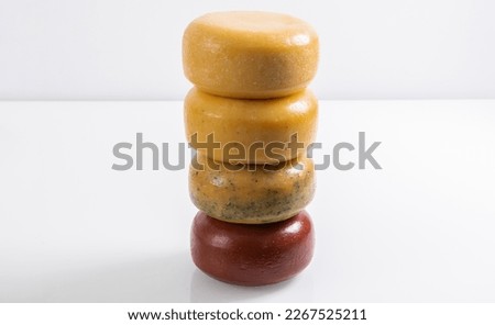 Different types of homemade traditional Bosnian cheese isolated on a white background