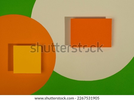 Minimalist green, orange and white template. Abstract geometric paper composition with 3D effect. Flat lay, copy space