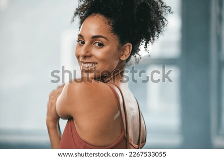 Black woman, smile portrait and exercise stretching for fitness workout, wellness training and happy cardio runner. in gym. African athlete, sports happiness and running warm up or motivation success Royalty-Free Stock Photo #2267533055