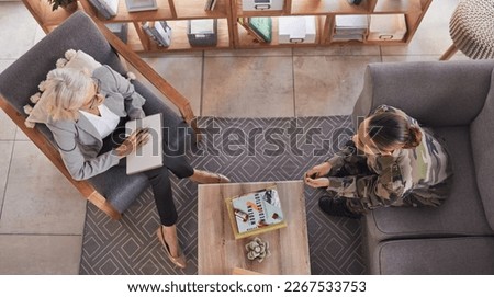 Therapy, support and military woman with psychologist talking about ptsd, mental health and stress from war. Psychology, above and veteran in communication with a therapist for consultation on trauma Royalty-Free Stock Photo #2267533753