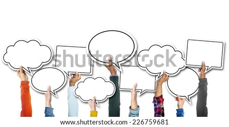 Group of Hands Holding Speech Bubbles Royalty-Free Stock Photo #226759681