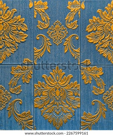 Close up of the 3D Vinyl Tiles, crafted in classical Baroque European and Morovian Pattern in teal blue and golden color engravings.