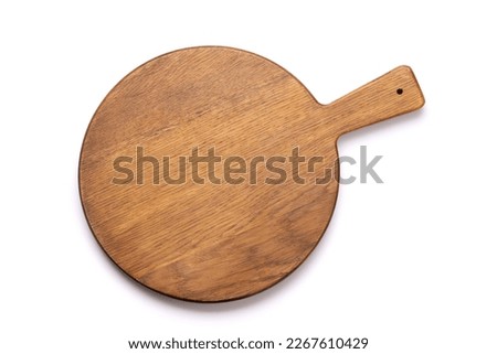Wooden cutting board. Isolated on white background. Flat lay top view Royalty-Free Stock Photo #2267610429