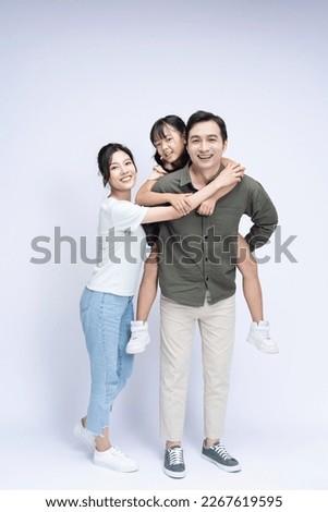 Image of Asian family on background