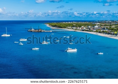 An aerial view along the coast of the island of Grand Turk on a bright sunny morning Royalty-Free Stock Photo #2267625171