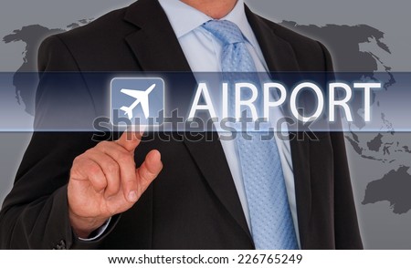 Airport - Businessman with touchscreen