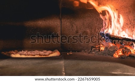 Italian pizza baked in a wood oven.Traditional Italian food. Copy space image.