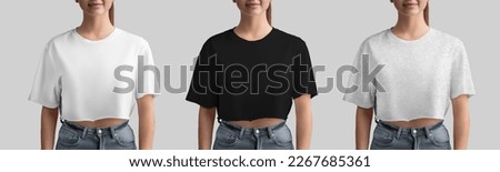 Mockup of white, black, heather crop top on beautiful girl in jeans, fashion clothes for design, print, front. Set of free cut t-shirts, women's clothing isolated on background. Template texture wear Royalty-Free Stock Photo #2267685361