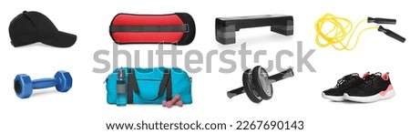 Set with skipping rope and other sporting goods on white background Royalty-Free Stock Photo #2267690143