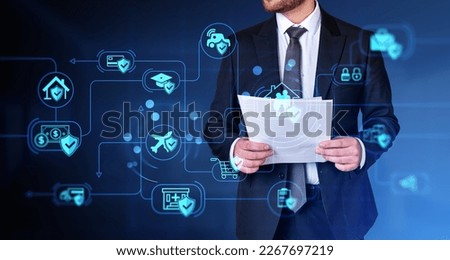 Businessman with papers in hands, a life insurance agent and consultant. Diverse digital icons with verification sign. Concept of safeguard and assurance