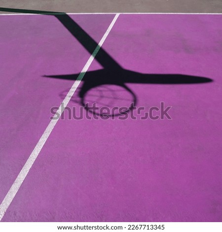 shadows on the purple street basket court, purple background