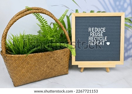 Letter board with quote Reduce Reuse Recycle, repeat and tree in basket. Environmental sustainable eco friendly, Zero waste healthy lifestyle concept Royalty-Free Stock Photo #2267721153