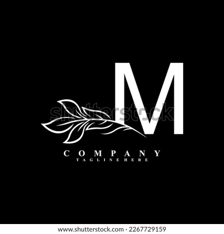 beautiful white M logo design with luxury flower. Initial M monogram symbol. flourish logo. suitable for logos of beauty, spa,salon,boutique,company,business,hotel,brand,etc