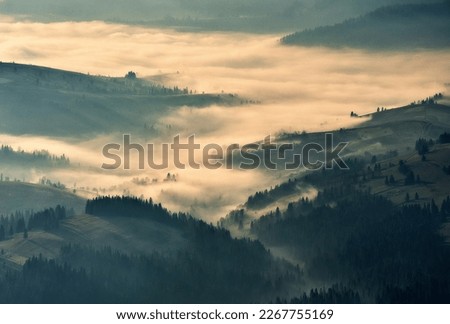 Mountain silhouettes in the fog. Graphic landscape on the theme of mountains Royalty-Free Stock Photo #2267755169