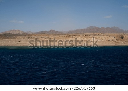 Red Sea in the Gulf of Aqaba, surrounded by the mountains of the Sinai Peninsula, Dahab, Egypt Royalty-Free Stock Photo #2267757153