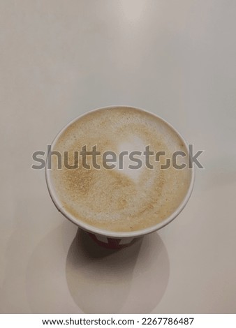 coffee with milk and a heart like picture 