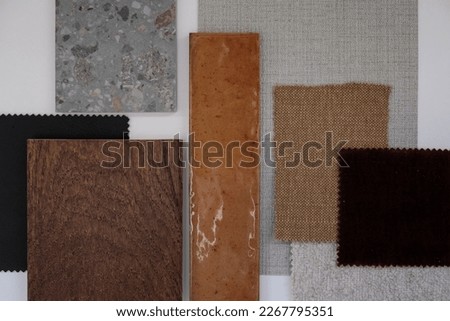 Moodboard with different fabrics, textures and tiles for interior design scheme