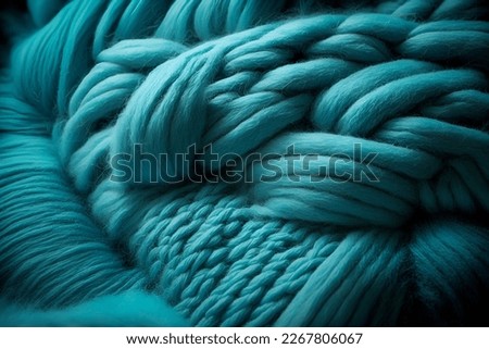 Bright turquoise woolen threads. Brains from yarn macro view knitting hobby needlework. Handmade natural rope skein warm clothes. Traditional knitting wool supplies Royalty-Free Stock Photo #2267806067
