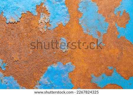 Old rusty metal background. Teal and orange color tone.