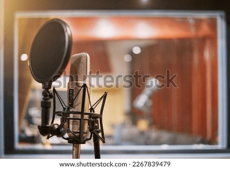 Microphone, studio and music with equipment at a record label for recording audio or sound for the radio. Singing, creative and art with a mic in an empty room for live streaming or production