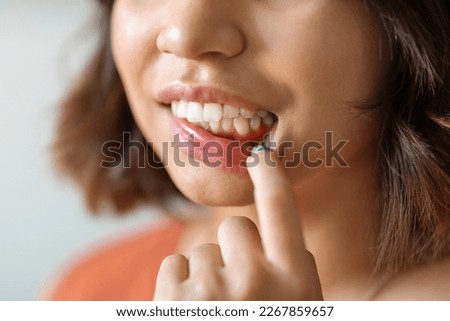 Gingivitis Concept. Young Woman Pulling Her Lip And Demonstrating Irritated Gums, Unrecognizable Female Suffering Gingival Inflammation And Dental Problems, Closeup Shot, Cropped Image Royalty-Free Stock Photo #2267859657