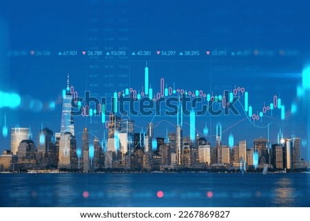 Skyline of New York City Financial Downtown Skyscrapers at night. Manhattan, NYC, USA. View from New Jersey. Forex candlestick graph hologram. The concept of internet trading, brokerage, analysis