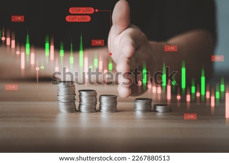 Concept of management in stock market investment and trading. Trader deciding to cut loss or stop loss when price going down. Royalty-Free Stock Photo #2267880513