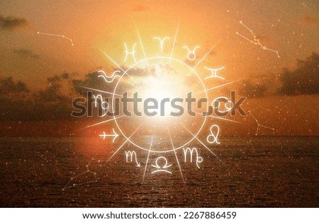 Zodiac wheel with 12 astrological signs and seascape on background Royalty-Free Stock Photo #2267886459
