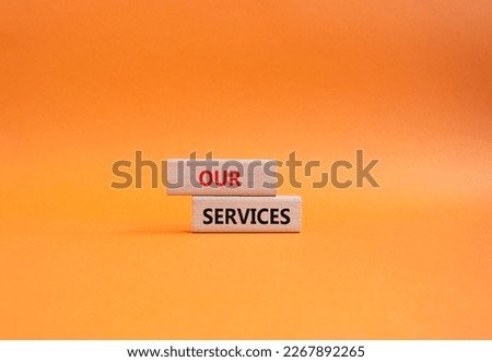 Our services symbol. Concept words Our services on wooden blocks. Beautiful orange background. Business and Our services concept. Copy space.