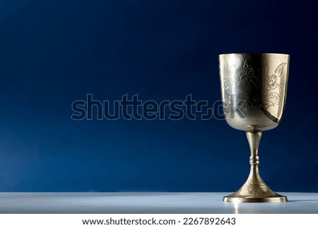 christian chalice on altar blue background blue background