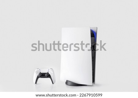 Next Generation game console isolated on white background Royalty-Free Stock Photo #2267910599