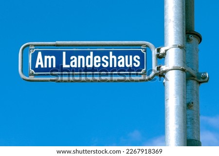enamel street name plate with name Am Landeshaus - engl: house of county in Wiesbaden, Germany
