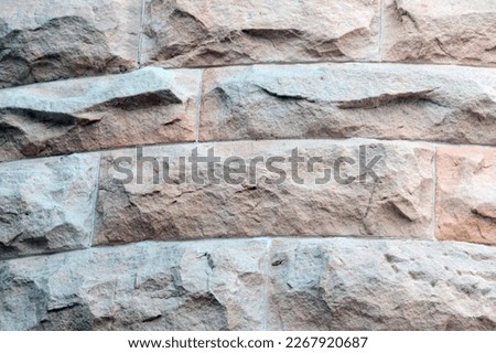 The background of the wall of the old building, the tiles, the texture of the fence, selective focus